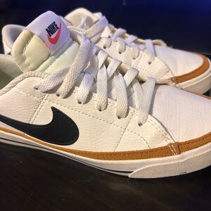 Nike White Sneakers with Black Swoosh and Light Tan Accents